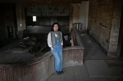 Tiff Piko in the Tecumseh Theater in Shawnee, OH on December 21, 2023. The building was built in 1908 and saved from the wrecking ball in 1976. Today, the exterior of the building is completely renovated and eyes are now focused on the second-story opera house for renovation.